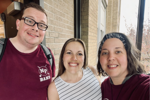  band and choir directors smiling
